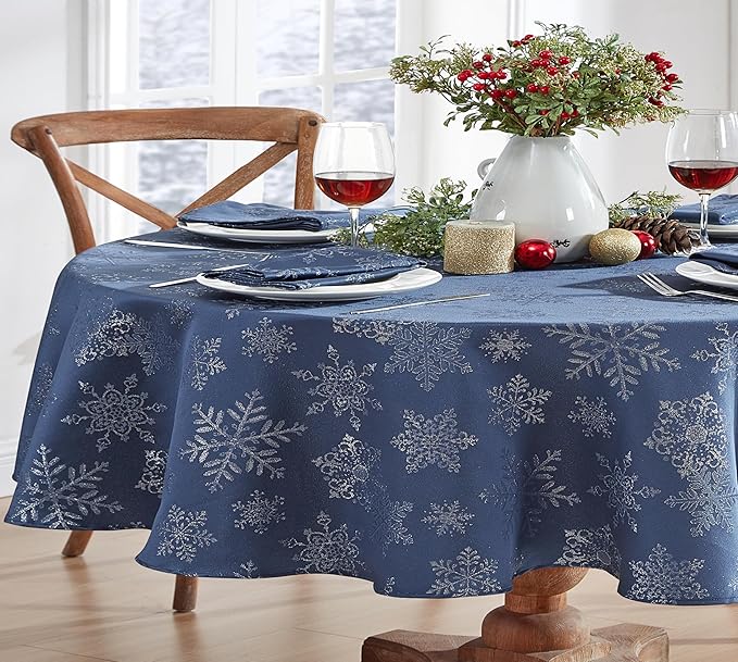 Newbridge Fancy Metallic Snowflake Christmas Fabric Tablecloth, 60 x 84 Inch Oval, Navy Silver, No-Iron Soil Resistant Sparkling Snowflakes Woven Holiday Table Cover